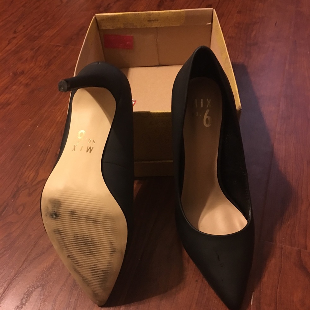 Matte black pumps